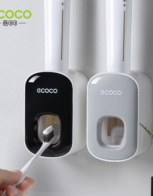 Load image into Gallery viewer, ECOCO Automatic Toothpaste Dispenser Wall Mount Bathroom Bathroom Accessories Waterproof Toothpaste Squeezer Toothbrush Holder

