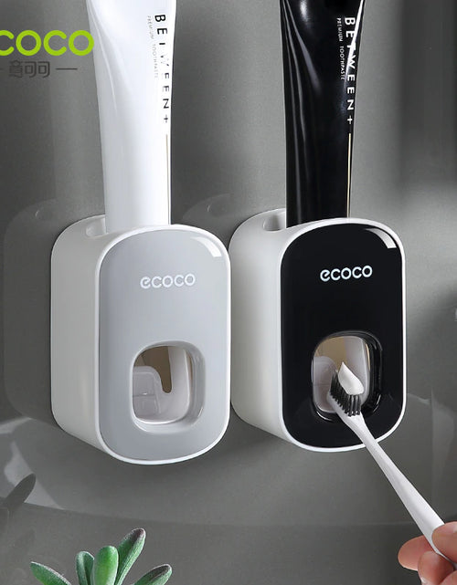 Load image into Gallery viewer, ECOCO Automatic Toothpaste Dispenser Wall Mount Bathroom Bathroom Accessories Waterproof Toothpaste Squeezer Toothbrush Holder
